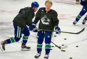 Vancouver Canucks Jack Rathbone in pre-game skate vs Edmonton Oilers during NHL action at Rogers Arena in Vancouver, BC, May 4, 2021. 
