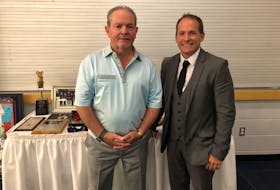 George Matthews, left, and Scott Chandler were inducted into the P.E.I. Sports Hall of Fame alongside the late Arthur Sullivan in a ceremony at Credit Union Place in Summerside on Friday, July 8. 