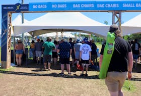Concertgoers stand in line at the gates of the 2022 Cavendish Beach Music Festival. - Logan MacLean • The Guardian