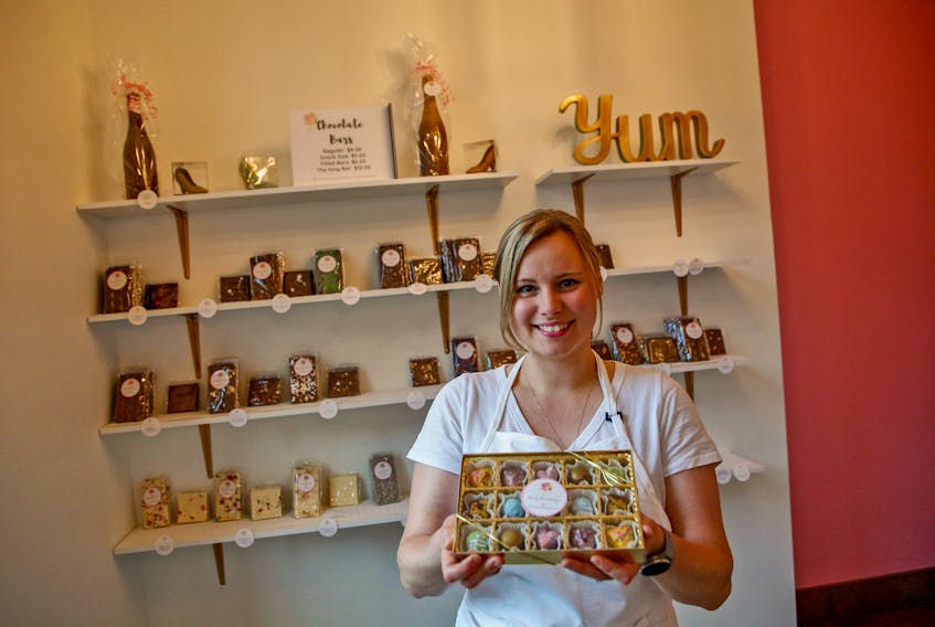 FOR RETALES:
Michelle Kolich, of Michelle Ashley's Bakery with some of her colorful truffles and chocolate, treats in her Halifax shop on Isleville Street Wednesday July 6, 2022.

TIM KROCHAK PHOTO