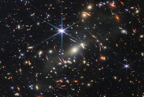 The first full-colour image from NASA's James Webb Space Telescope, a revolutionary apparatus designed to peer through the cosmos to the dawn of the universe, shows the galaxy cluster SMACS 0723, known as Webb’s First Deep Field, in a composite made from images at different wavelengths taken with a Near-Infrared Camera and released Monday, July 11, 2022. - NASA, ESA, CSA, STScI, Webb ERO Production Team / Handout via Reuters