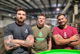 Head brewer Duncan Tennant, left, Tom Williamson (owner/finances), and Craig Farewell (owner) are proud of what they’ve created at Banished Brewing. While they have a strong passion for the craft, their hope is to open taste buds with their original flavours. - Contributed
