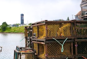 Lobster traps stacked up at the dock on Lennox Island. The Lennox Island First Nation began a moderate livelihood fishery on May 7. - Stu Neatby/SaltWire Network