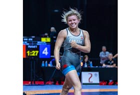 Hannah Taylor is all smiles after winning the gold medal in the 57kg weight class at the 2022 Canada Cup wrestling event at the Island Petroleum Energy Centre on July 2. - Bill Bain Photo/Courtesy of Hannah Taylor.