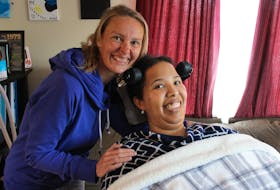 Angie Parker-Brown of Truro, N.S. lives with ALS. She recently wrote a book sharing her story and message with others, including her twin daughters.