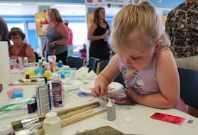 During the 2019 edition of the Seaside Daze Festival, Quinn MacDonald was found concentrating as she gets some glitter paint to add to her rock during the Paint it Forward event at Dominion Legion. The festival will resume live events this year for the first time since 2019. CAPE BRETON POST FILE