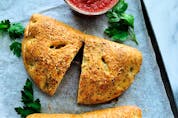  Sausage and pepper calzones are great for freezing for future meals.
