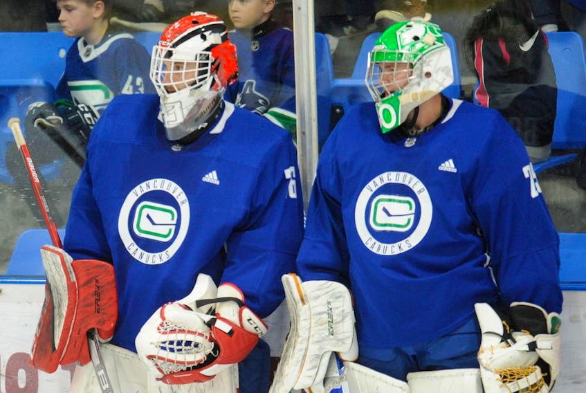  Samuel Richard (l) and Brett Brochu in action during the Vancouver Canucks development camp at UBC on Wednesday.