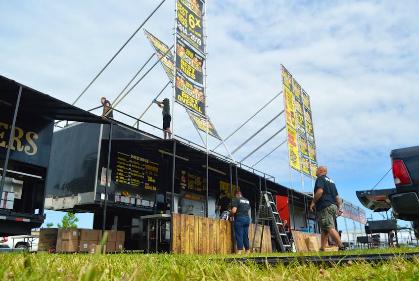 The crew of Crabby’s BBQ Shack is shown setting up for Rotary Ribfest 2022 at Open Hearth Park in Sydney. The fest begins today featuring food from Texas Rangers, Camp 31, Billy Bones BBQ, and Crabby’s. Hours are Friday and Saturday 11 a.m. until 11 p.m. and Sunday from 11 a.m. until 7 p.m. GREG MCNEIL/CAPE BRETON POST