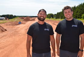 Two of the developers with the Hidden Valley subdivision in the north end of Charlottetown, Chris MacMillan, left, and Will Zafiris, said July 14 that there are plans that will eventually connect their development to Malpeque Road. Dave Stewart • The Guardian