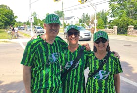 Bob Antymniuk and his wife Olenka, centre, and her sister Iris Haugen made the trip from Western Canada to support the Saskatchewan Roughriders in Touchdown Atlantic July 16 at Acadia University. Jason Malloy