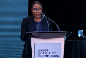 Commission counsel Ronke Akinyemi delivers a foundational document related to Gabriel Wortman's financial misdealings at the Mass Casualty Commission in Halifax on Tuesday, July 19, 2022. - Andrew Vaughan / The Canadian Press