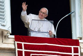  Pope Francis waves during Regina Caeli prayer, in Saint Peter’s Square at the Vatican, May 1, 2022.