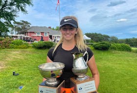 Ashburn golfer Abbey Baker poses with her provincial junior and juvenile girls' trophies she won at the 2021 Nova Scotia Junior Championship at Digby Pines. - NOVA SCOTIA GOLF ASSOCIATION
