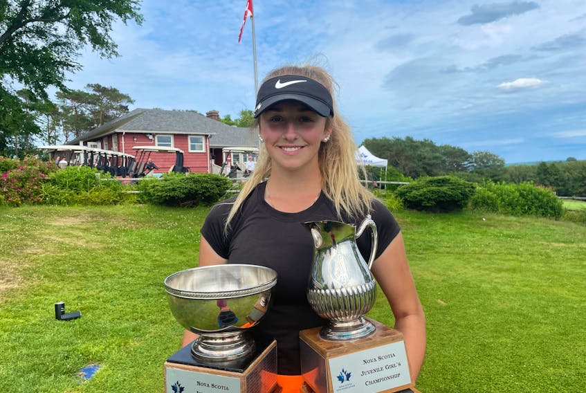 Ashburn golfer Abbey Baker poses with her provincial junior and juvenile girls' trophies she won at the 2021 Nova Scotia Junior Championship at Digby Pines. - NOVA SCOTIA GOLF ASSOCIATION
