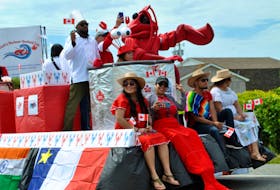 Numerous nationalities were represented by temporary foreign workers on the Clark’s Harbour Seafoods float in the Canada Day parade in Clark’s Harbour. The float won judge’s choice and people’s choice awards for the parade. KATHY JOHNSON

