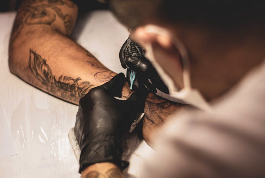 Choosing a tattoo design is a very personal choice. Sometimes, people opt for 'cool' designs, while others choose something with a deep, personal meaning for them. - Unsplash