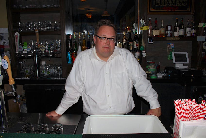“I love art and entertainment and it seemed like the right opportunity and fit for me, so I just dove right in on a whim,” says Allan Bearns, the new owner of Erin's Pub. Andrew Waterman/The Telegram