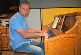 Maksim ‘Max’ Sukharevskyi is very much at home in front of a piano. A piano was recently donated to the family by Barry Hill and his wife.