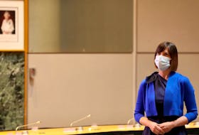 Dr. Vera Etches wears a mask during a June 9 ceremony in which she and the Ottawa Public Health team were presented with the Key to the City.