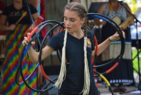 Lexis Francis of Mi'kmaq Heritage Actors performs a hoop dance as part of a wind dance performance at the  the  DiverseCity Multicultural Festival in Summerside on Sunday, July 24.