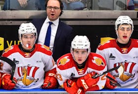 New Cape Breton Eagles head coach Jon Goyens, middle, considers his coaching career to have been a grind, starting from the bottom at the minor hockey level to eventually moving up and now coaching in the Quebec Major Junior Hockey League. PHOTO/GETTY IMAGES