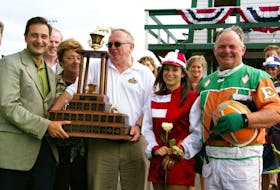 Earl Smith, right, won his one and only Gold Cup and Saucer Race title aboard Pownal Bay Matt in 2008. Pictured, from left, are former P.E.I. premier Robert Ghiz, Lorna and Ian Smith, the horse’s owners, Lacey MacLauchlan, the Gold Cup and Saucer ambassador, and Smith. Contributed