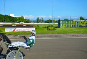 Marc Campbell warms up a horse before a race at Red Shores Racetrack and Casino in Charlottetown earlier this season. Campbell recorded four driving wins on a harness card in Charlottetown on July 28. Jason Simmonds/The Guardian