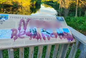 Patrick McNutt shot this photo of a plaque at Andrews Pond that had been painted with obscene language. McNutt blurred out some of the words. Contributed