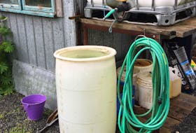 Brenda Bailey’s rain barrel at Meander River Farm in Ashdale, Hants County is situated under a gutter downspout to capture rainwater and is about four feet off the ground for easy access. Contributed photo