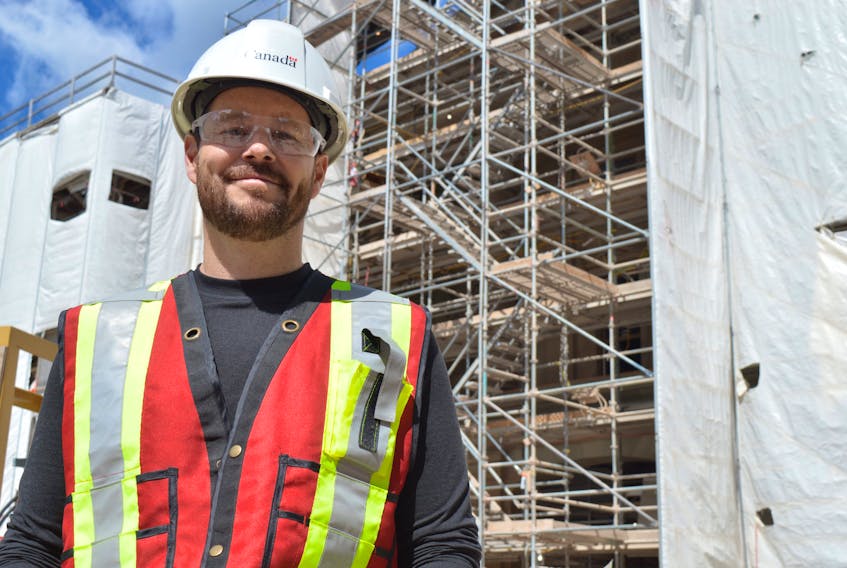 Tim Chandler, senior project manager with Public Service and Public Procurement Canada, said the sail cloth that has been protecting Province House in Charlottetown from the elements during the past four years started coming down July 4. Dave Stewart • The Guardian