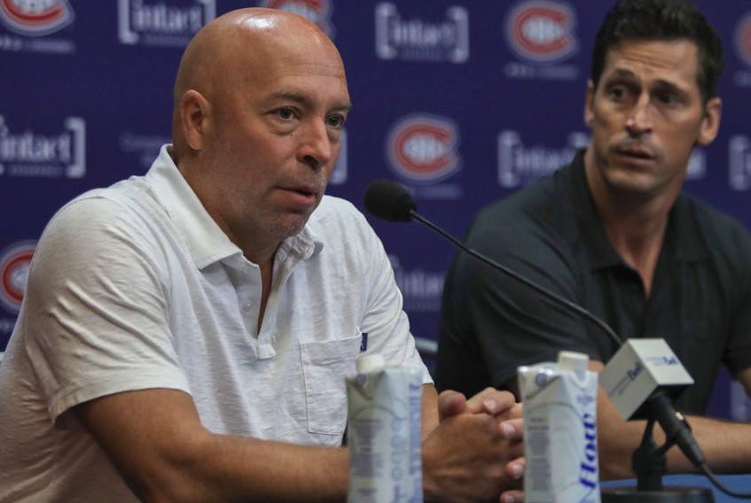 Montreal Canadiens GM Kent Hughes (left) and Vincent Lecavalier, a special advisor to hockey operations for the club, at a press conference ahead of Thursday's NHL Draft, at the Bell Sports Complex in Brossard Monday, July 4, 2022.