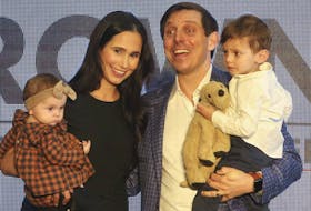 Patrick Brown, with his wife Genevieve and son Theodore and daughter Savannah, announces he will run for the federal Conservative leadership, at a Brampton banquet hall on March 13, 2022.