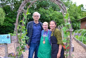 Valley Community Learning Association (VCLA) executive director Peter Gillis, adult learner Glenda Longley and YMCA employment and education lead Kathleen Novelia in one of the community gardens at the VCLA Community Hub in Kentville. KIRK STARRATT