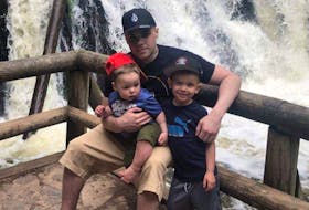 Jessie Morrissey sits with his two sons. Morrissey disappeared in February and his mother is frustrated with what she says is a lack of communication by the RCMP. Contributed