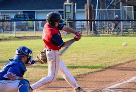 Doug Hassell, of the Kentville Wildcats, hits an RBI single in the first inning of their Nova Scotia Senior Baseball League contest with Nova Scotia’s Canada Games team.