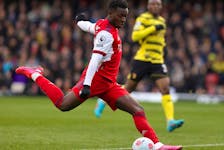 In this file photo taken on March 6, 2022 Arsenal's Portuguese defender Nuno Tavares kicks the ball during the English Premier League football match between Watford and Arsenal at Vicarage Road Stadium in Watford, north-west of London. may be used in extra time. No video emulation. Social media in-match use limited to 120 images. An additional 40 images may be used in extra time. No use in betting publications, games or single club/league/player publications. /