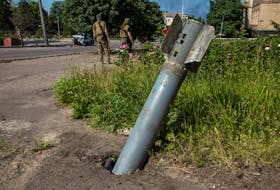 FILE PHOTO: An unexploded shell from a multiple rocket launch system is seen stuck in the ground, as Russia's attack on Ukraine continues, in the town of Lysychansk, Luhansk region, Ukraine June 10, 2022. REUTERS/Oleksandr Ratushniak  An unexploded shell from a multiple rocket launch system is seen stuck in the ground, as Russia's attack on Ukraine continues, in the town of Lysychansk in the Luhansk region of Ukraine on June 10. REUTERS/Oleksandr Ratushniak