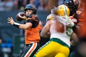 B.C. Lions quarterback Nathan Rourke is shown Saturday night, when he threw five touchdown passes — all in the first half — in a 46-14 victory over the visiting Edmonton Elks.