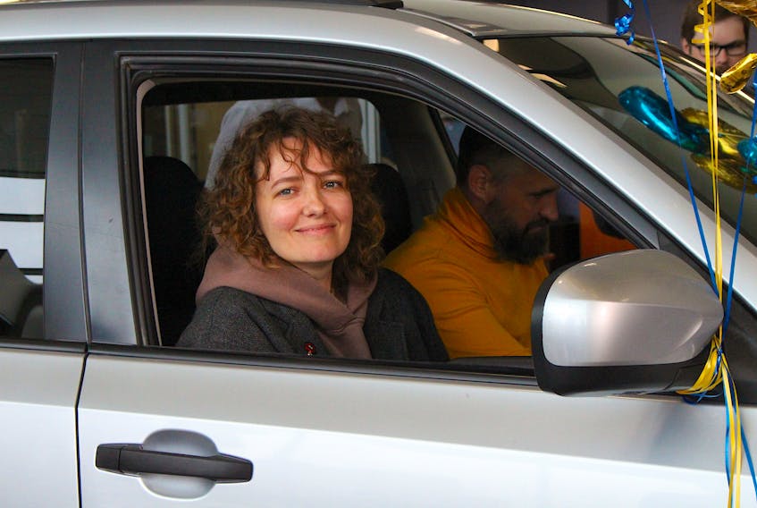 Tata Senyk, whose family was uprooted from their home in Dnipro, Ukraine because of the Russian invasion, struggled to find the words to describe how it felt to be given a preowned vehicle by Capital Subaru in St. John's, where they now live. “We were shocked, we never expected it,” she said. Andrew Waterman/SaltWire Network