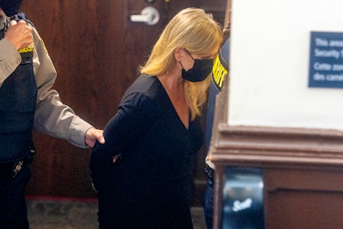 Former IWK Health Centre CEO Tracy Kitch is escorted out of Halifax provincial court by sheriff's deputies Wednesday after she was sentenced to five months in jail and a year’s probation for defrauding the Halifax hospital of more than $43,000. 
Ryan Taplin - The Chronicle Herald