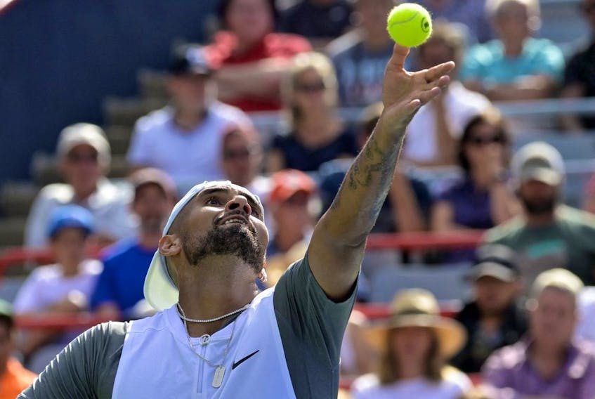 Nick Kyrgios serves against Daniil Medvedev (not pictured) in second-round play at IGA Stadium in Montreal Wednesday, Aug. 10, 2022.