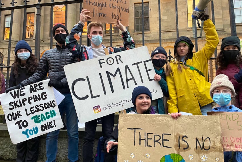 Students protest at Province House in Halifax to demand stronger climate legislation in November 2021. - Tynette Deveau