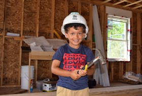 Jaxon Williams is ready to lend a hand in building his new house in Stellarton. Ray Burns – The News