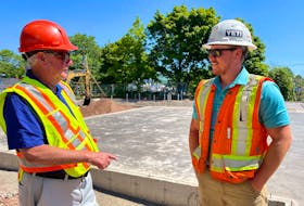 Project lead Roger MacIsaac, left, talks to project superintendent Dylan MacIsaac of Iron Maple Constructors about the $2.198-million Pugwash Library project under construction in the village. DARRELL COLE • MUNICIPALITY OF THE COUNTY OF CUMBERLAND