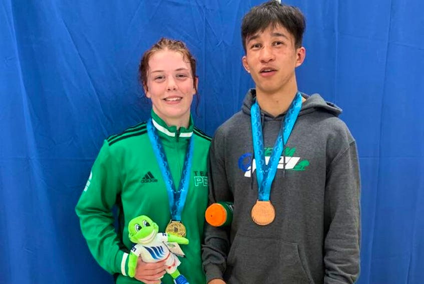 Vanessa Keefe, left, and RJ Hetherington captured P.E.I.’s first two medals at the 2022 Canada Summer Games – gold and bronze respectively – in wrestling on Aug. 11. - Team P.E.I. Facebook