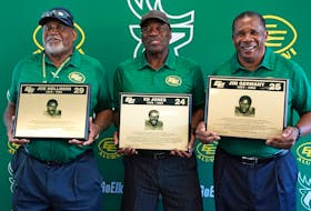 The Canadian Football League's Edmonton Elks football organization added former players Joe Hollimon, left, Ed Jones and Jim Germany to their Wall of Honour at Commonwealth Stadium in Edmonton on Friday Aug. 12, 2022.