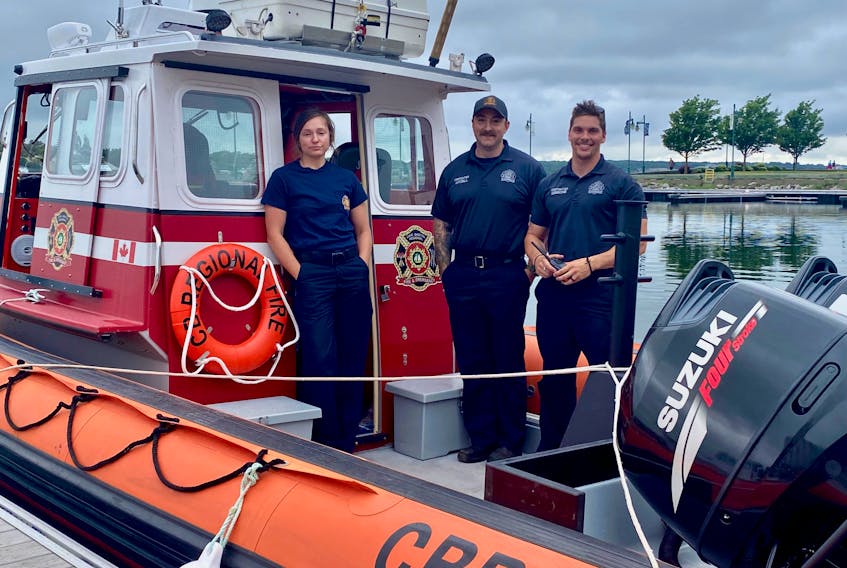 Cape Breton Regional firefighters Kylie Ballah, from left, Dave Witzell and Shea Gibbons were part of a department water rescue squad that successfully rescued two youngsters who had drifted away from shore on an inflatable while swimming at Indian Beach in North Sydney. The fourth member of the team was Scott Farrow. DAVID JALA/CAPE BRETON POST