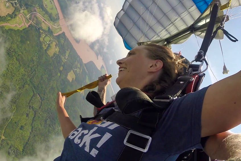 Columnist Katy Jean finds adventure in the clouds on her first skydiving descent.