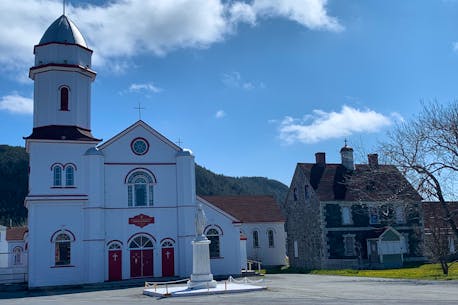 Sacred Heart Roman Catholic Church in Placentia was built on an old graveyard; parishioners question whether that legally excludes it from the bankruptcy sale process